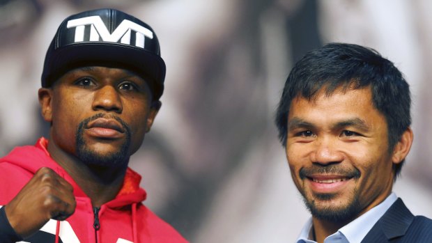 Floyd Mayweather and Manny Pacquiao pose at their final press conference.