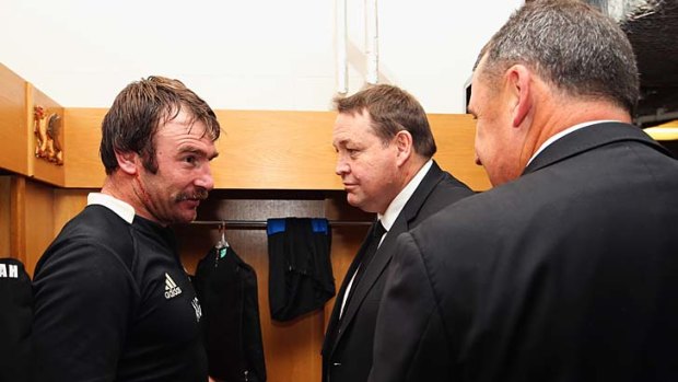 Andrew Hore talks to All Blacks head coach Steve Hansen and assistant coach Ian Foster after the match.