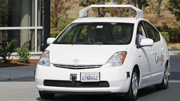 One of Google's driverless cars, driven by the California Edmund G Brown Jr.