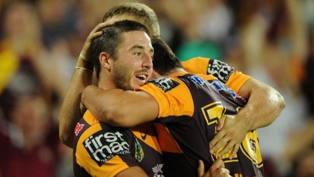 Lachlan Maranta of the Broncos celebrates a try with Ben Hunt.