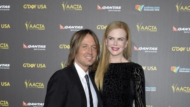Grammy-nominated singer Keith Urban and actress wife Nicole Kidman pose at the 2015 G'Day USA Los Angeles Gala.