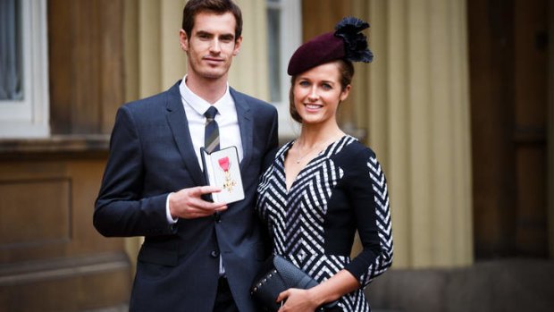 Wimbledon champion Andy Murray and his girlfriend Kim Sears pose at Buckingham Palace.