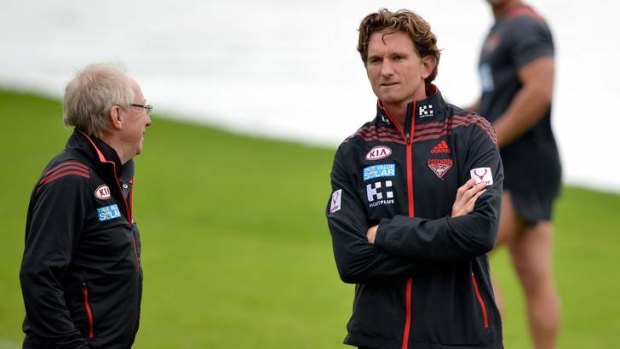 Essendon club doctor Bruce Reid with coach James Hird at Windy Hill training on Thursday.