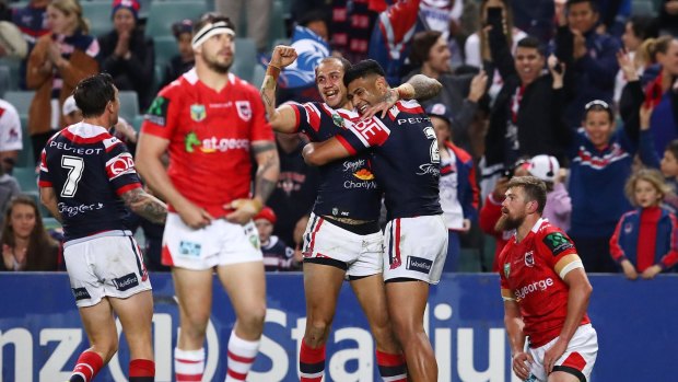 Late-season resurgence: Blake Ferguson celebrates after scoring a try during the Roosters' win over St George Illawarra at Allianz Stadium.