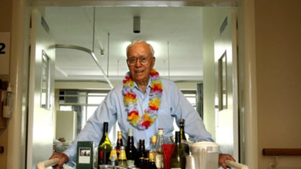 Is there a barman in the house?  John Whalan begins his Happy Hour drinks round at Greenwich Hospital.