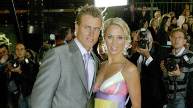 Cashing in ... Lleyton and Bec Hewitt.