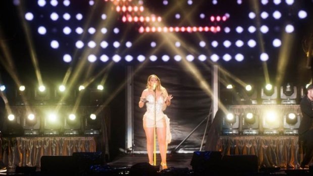 Mariah Carey opened her Australian tour with a rain-soaked performance at Sandalford on Saturday night.