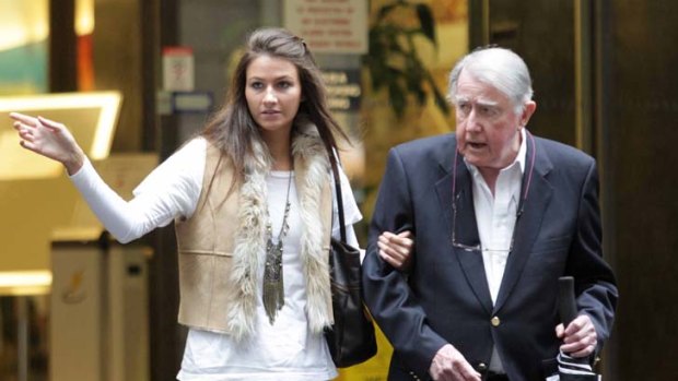 Dispute &#8230; Neville Wran with his younger daughter Harriet leaving his office in the city yesterday. His business associate says the former premier is still mentally sharp.