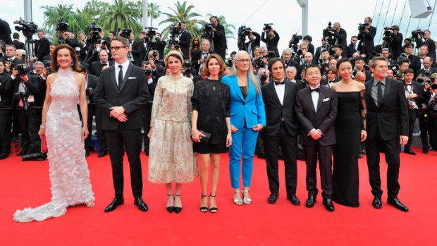 In balance: Cannes jury members strut on the red carpet.