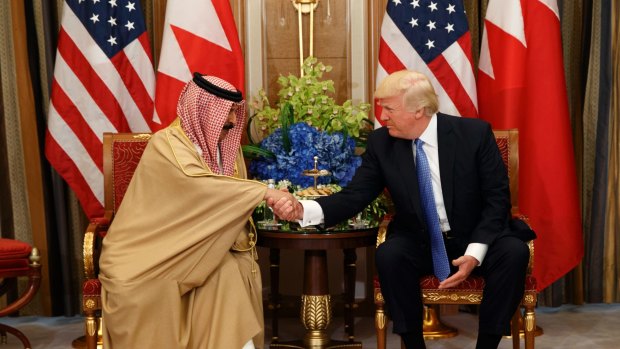 U.S. President Donald Trump, right, holds a bilateral meeting with Bahrain's King Hamad bin Isa Al Khalifa on Sunday.