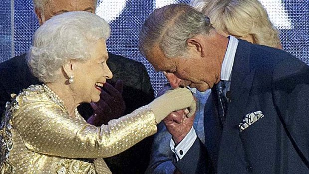A kiss for his mother ... Britain's Prince Charles shows his affection for the Queen.
