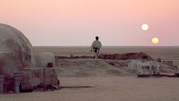 A galaxy far, far away ... Luke Skywalker's home planet, Tatooine, is orbited by two suns in <em>Star Wars</em>.