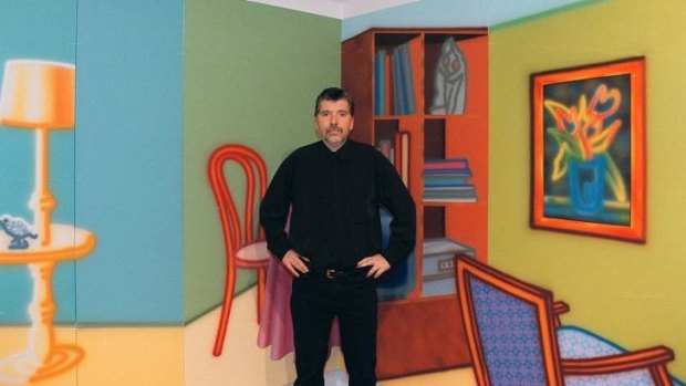 Howard Arkley with works from his final show at the Venice Biennale in 1999.