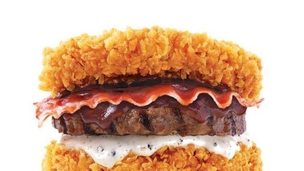 KFC in Korea just released this calorific breadless burger - the Zinger Double Down King. The fast food chain's bunless burger consists of cheese, bacon, a beef patty, and sauces between two giant pieces of fried chicken. To confirm all your worst nightmares this burger is 3138 kj (750cal)!
