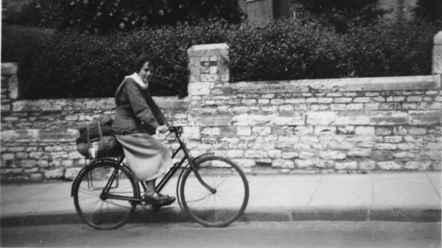 Cook cycling in Europe as a younger woman.