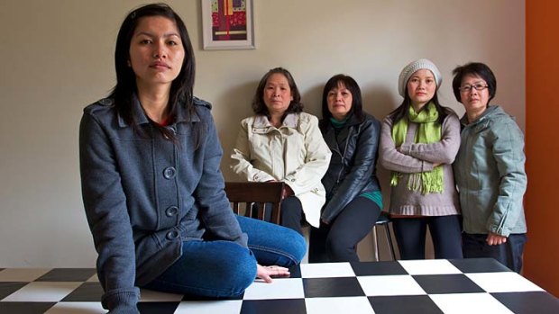 Bullying claims: Glendal Foods workers (from left) Hiep Nguyen, Nuong Nguyen, Quyen Le, Lieu Phan and Huong Vu.