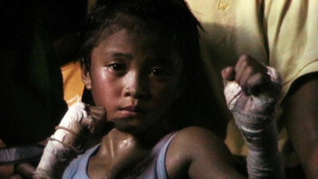 Stam is among an estimated 30,000 children who fight professionally in Muay Thai child boxing tournaments in Thailand.