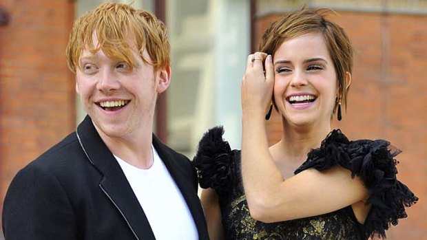 Sad to see the end ... actors Rupert Grint and Emma Watson.