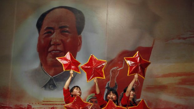 Nostalgia ... performers take to the stage at a Beijing restaurant this week. As China prepares to mark the 90th anniversary of the Communist Party, ''red'' themed activities are becoming increasingly popular.