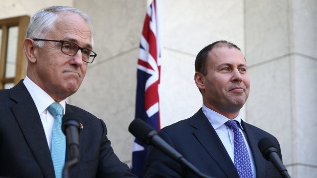 Backdown: Malcolm Turnbull and Josh Frydenberg have ruled out an emissions intensity scheme.