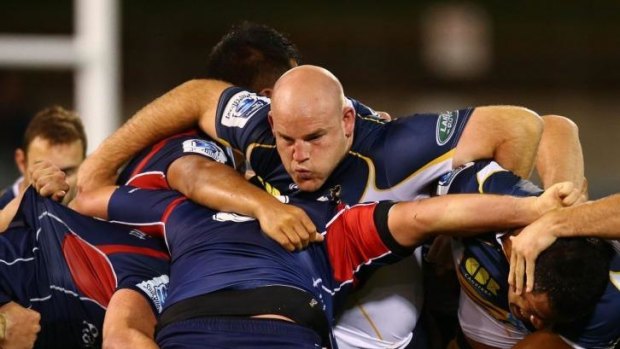 Stephen Moore takes on the Rebels'  pack on Saturday night.