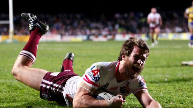 David Williams crosses for the Sea Eagles in their four-point win over the Eels.