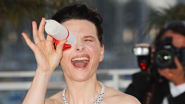 Juliette Binoche ... calls herself 'actress' not 'actor'. Above: with her Best Actress Palm d'Or award at Cannes last year.