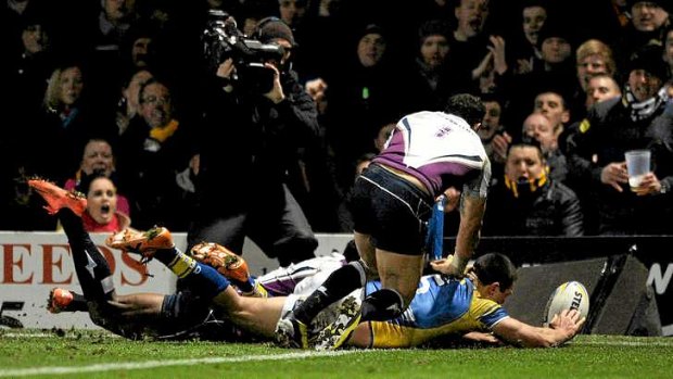 Ryan Hall of Leeds Rhinos goes over for a try.