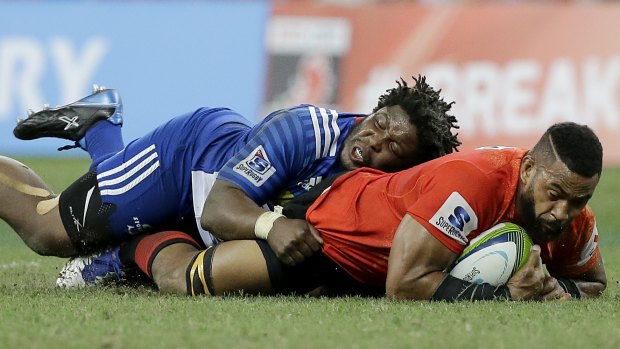 Stalemate: Andrew Durutalo is tackled by Siyamthanda Kolisi of the Stormers.