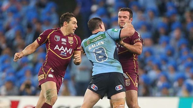 Bad example: Paul Gallen's punch to Nate Myles' head was hailed as a ''great Origin moment'' by his NSW coach, Laurie Daley.