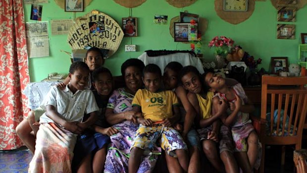 Loami Kula, mother of Akuila Uate, at home with family.