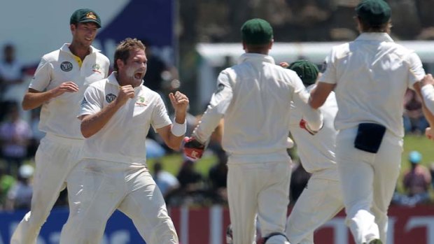 Fab five ... Ryan Harris starred for Australia with a five-wicket haul in Galle yesterday.