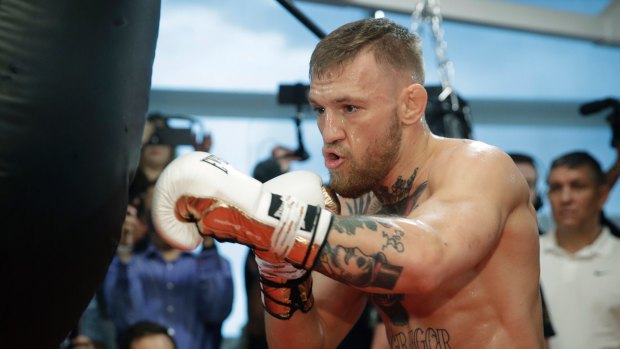 Born fighter: Conor McGregor trains in an open session ahead of his mega bout with Floyd Mayweather.