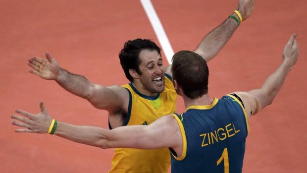 Onslaught ... Australia's Aidan Zingel and Aden Tutton celebrate a point against Italy.