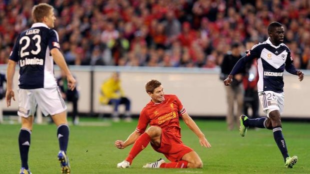 On target: Liverpool captain Steven Gerrard kicks the first goal for the visiting side at the MCG.