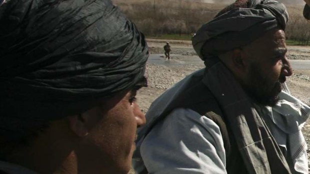 Afghan men like these who worked alongside American troops are being denied US visas.
