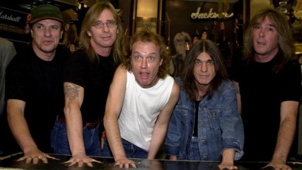 AC/DC band members, from left, Brian Johnson, Phil Rudd, Angus Young, Malcolm Young and Cliff Williams in 2000.