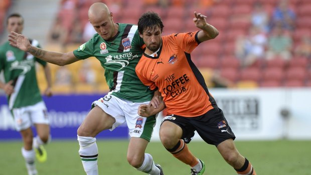 Thomas Broich challenges for the ball.