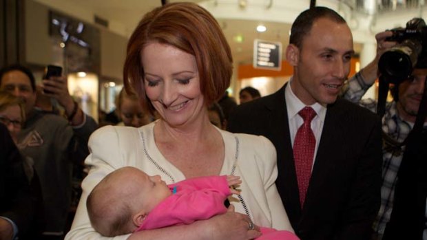 Julia Gillard meets a future voter in Penrith last month.