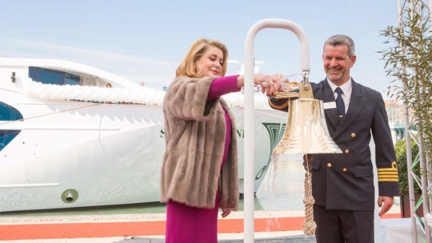 French film star Catherine Deneuve launches the SS Catherine; one of the luxury cabins on board.