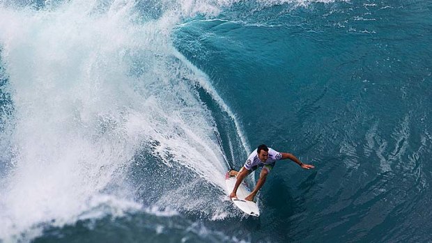 Perfect form &#8230; Joel Parkinson remains in the hunt to claim his first world title after moving through to the quarter-finals of the Pipeline Masters in Hawaii.