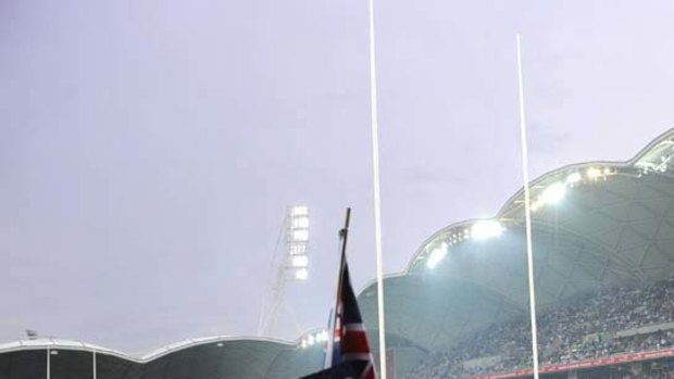 Sign of the times: fans cheer on the Melbourne Rebels.
