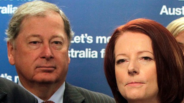 Hopeful ... ALP member for Brisbane Arch Bevis pictured with Prime Minister Julia Gillard during the election campaign. The veteran MP has not given up on retaining his seat.