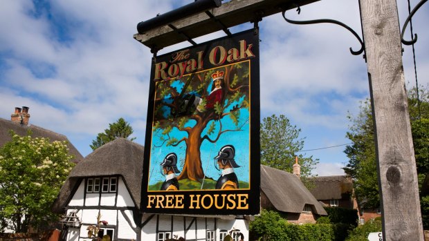 A sign for a Royal Oak pub in Wiltshire, England illustrates the story behind the name.
