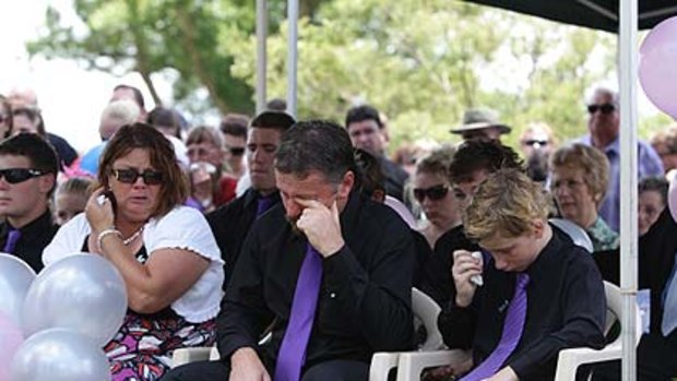 Donna Rice's widower John and son Blake at the funeral for her other son Jordan, who died in the car with her.