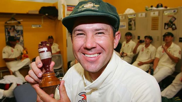 Ricky Ponting poses with a replica of the Ashes urn after day five of the third Test in Perth in 2006.