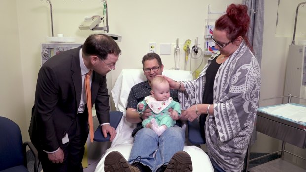 Professor John Rasko with Mark Lee, his partner and his daughter, who is a carrier for haemophilia B.