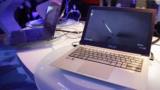 Ultrabooks at the 2012 CES tradeshow . . . great if you can stop running your hands across the cool, polished metal.