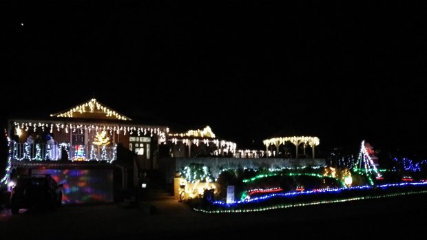 Roland also decorated his Hillarys home with 5,000 Christmas lights to raise money for the Western Australian Tandem Cycling Advisory Council.