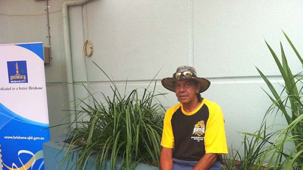 St George resident Allen Stanley outside the evacuation centre at the RNA Showgrounds.